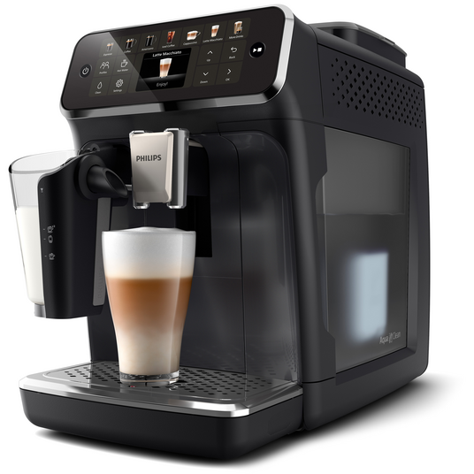 Una máquina de café negra con un vaso de latte macchiato.